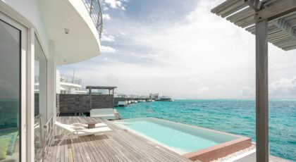 Stunning oceanfront villa featuring an infinity pool and modern design.