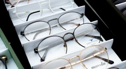 Close-up of assorted eyeglasses showcased in an orderly fashion for selection.