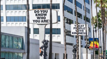 Explore iconic signs and architecture along Hollywood Boulevard in Los Angeles.