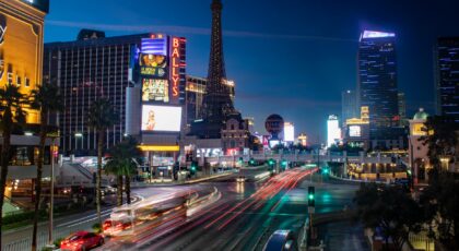 Captivating night view of Las Vegas Strip with vibrant traffic and iconic hotels.